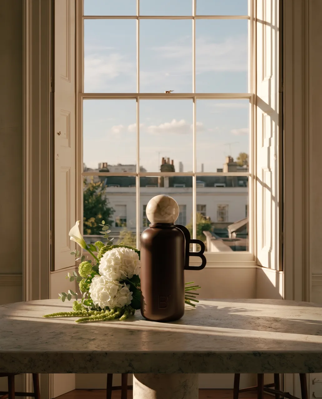 Beau product photography, insulated flask on a windowsill with white hydrangeas