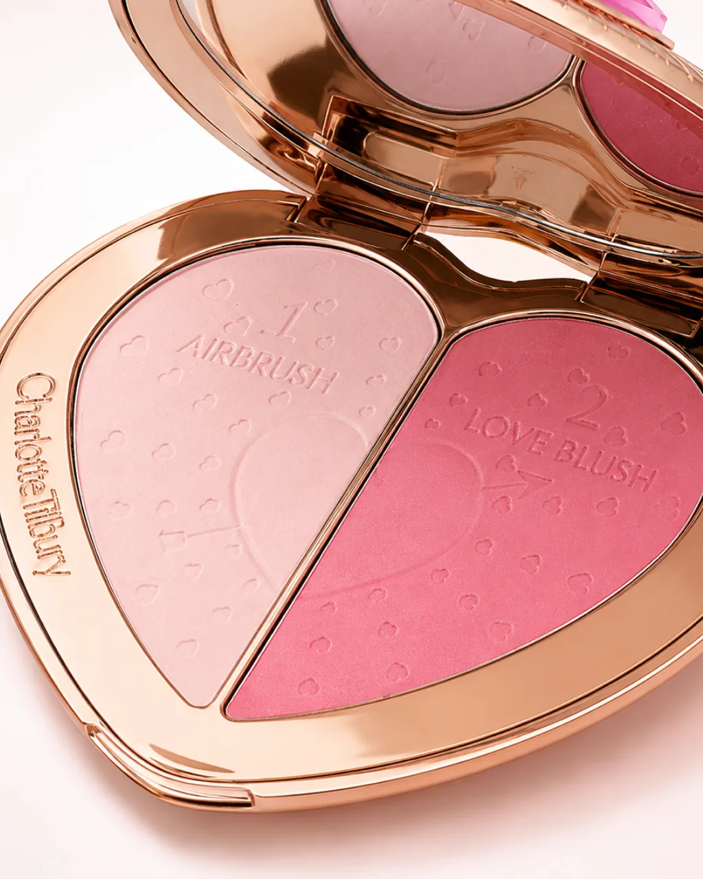 Charlotte Tilbury beauty product photography, open blush and highlighter compact