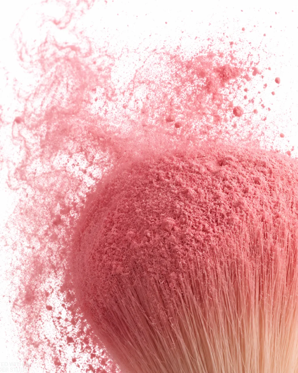 Charlotte Tilbury blush macro, pink powder bursting from a makeup brush