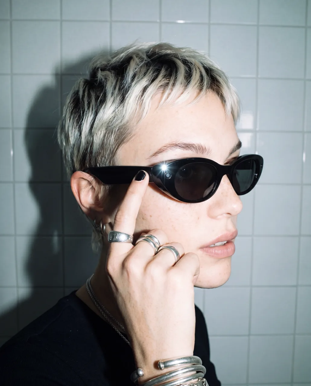 Meta smart glasses concept campaign, profile portrait with stacked silver rings