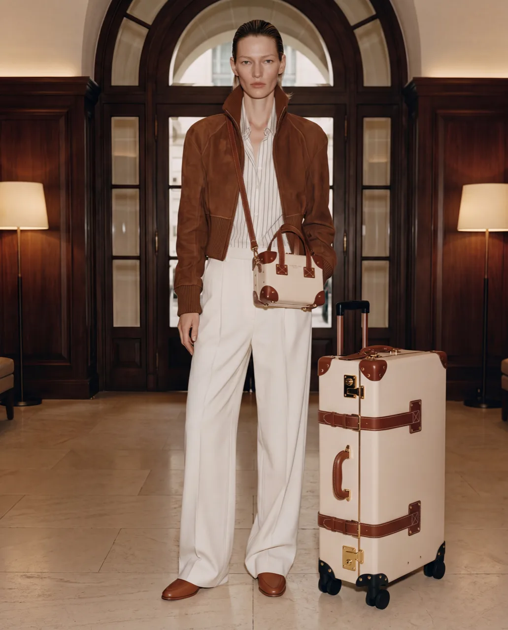 Steamline luggage concept campaign, trunk case in a hotel lobby